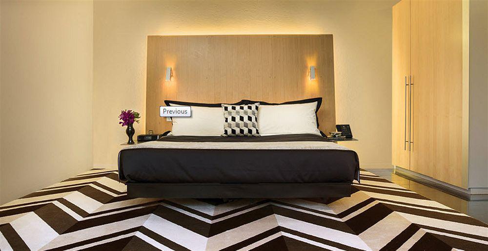 Adelphi Hotel Melbourne City Exterior foto A bedroom at the hotel